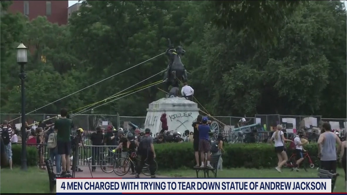 Four charged in Andrew Jackson statue attack case